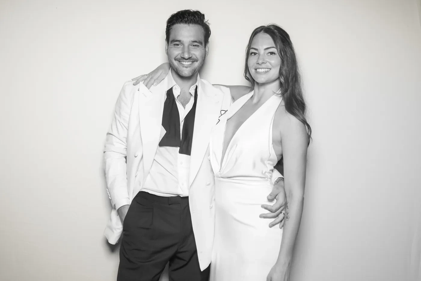 A wedding couple in black and white at a Pic Booth glam photo booth in Niagara