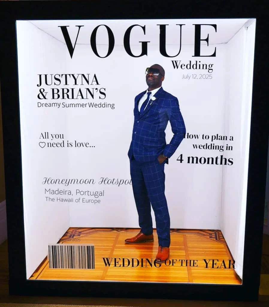 A wedding guest on the Vogue cover inside the Magazine Booth at a Niagara wedding