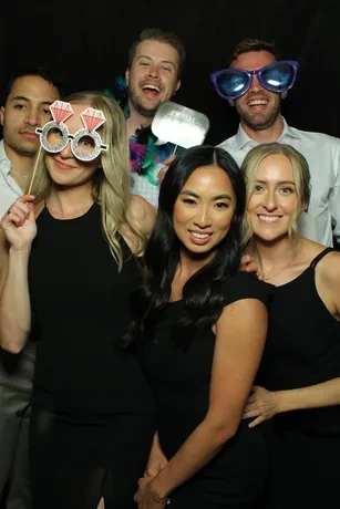 Guests posing at a Pic Booth Magic Mirror photo booth rental at a Niagara Falls wedding