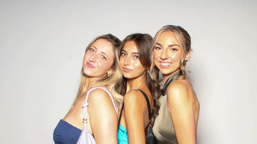Guests posing together at a Pic Booth photo booth at a Niagara wedding reception
