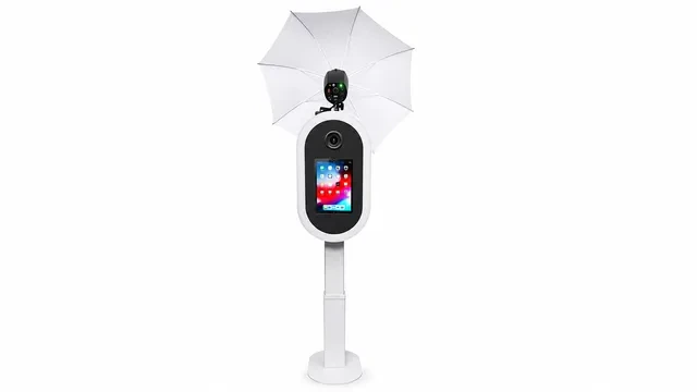 The white DSLR photo booth unit