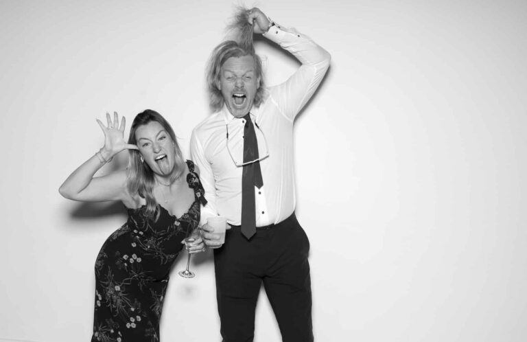 Happy couple using photo booth at St. Catharines wedding